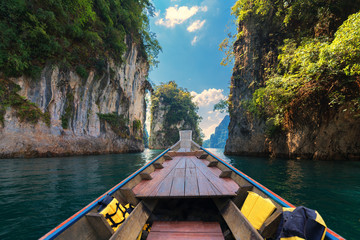Fototapeta premium Longtail boat trip in Cheow Lan Lake, Khao Sok National Park, Surat Thani Province, Thailand.