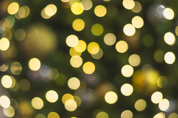 bokeh or defocused of decoration lighting on pine tree for merry christmas and happy new year.