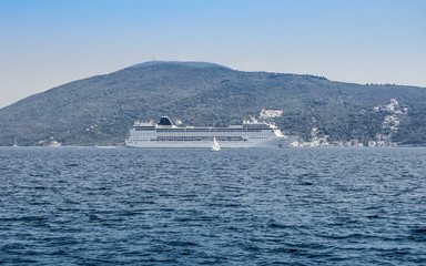 Cruise liner in the port - Montenegro - travel background