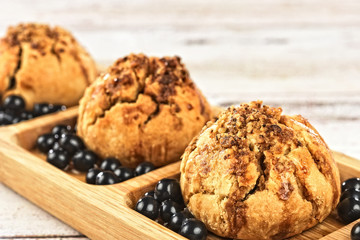 delicious cookies on wooden plate