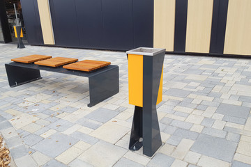 modern street furniture on the sidewalk in the city