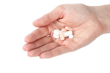 pills in woman hand