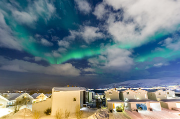 the polar lights over the city of Tromso