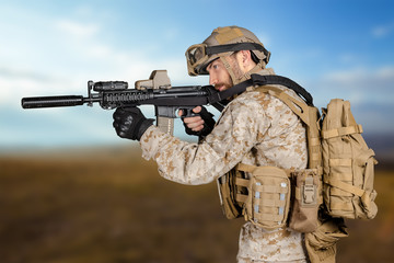 Fototapeta premium Modern soldier with rifle