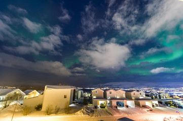 the polar lights over the city of Tromso