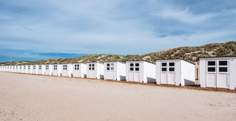 bathhouses in a row on the beach