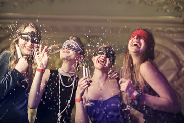 Girls at a masked party