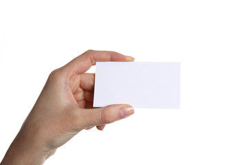 Female hand holding business card in office