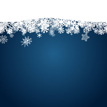 Christmas blue background with white snowflakes