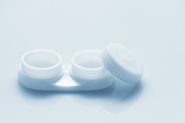 storage containers lenses on white background