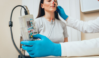 Patient nerves testing using electromyography. EMG