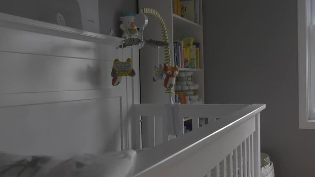 Baby Nursery Forest Themed Crib And Mobile Rising View 4k