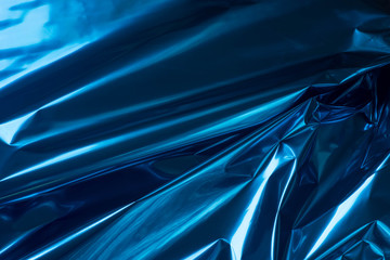 blue folded metallic foil abstract bacgkground