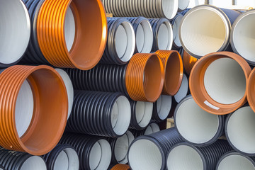 Stack of corrugated PVC sewer or drain pipes