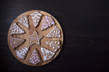Circle with ginger biscuits in the form of fir trees