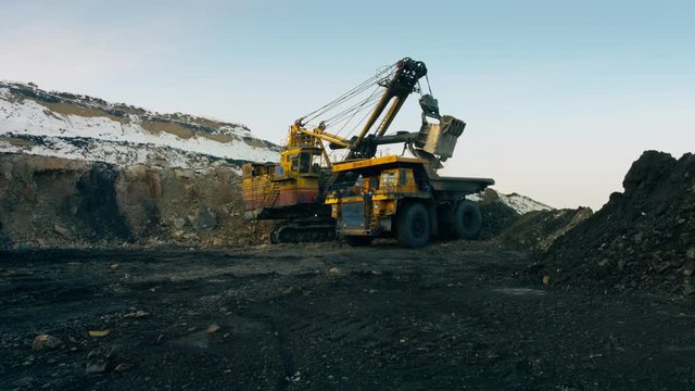 Large multi-ton truck with coal