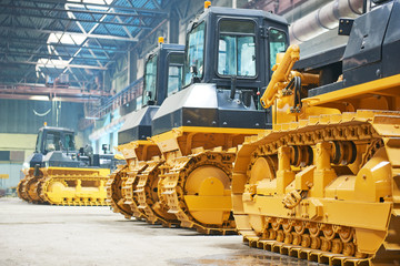 bulldozer in assembly shop in factory