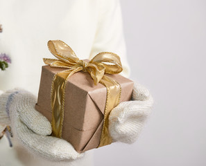 hands holding craft gift box