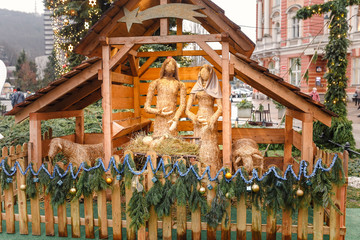 Obraz premium Christmas Manger scene with figurines including Jesus and other biblical characters