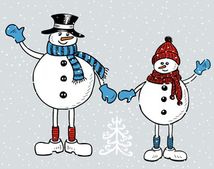 Young cheerful snowmen in Christmas time