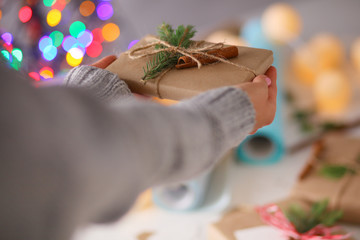 Hands of woman holding christmas gift box. Christmas