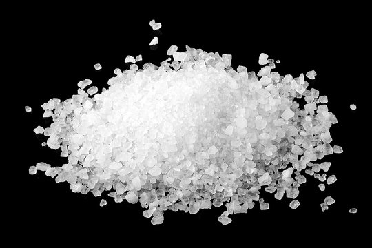 salt white sea, isolated on a black background, full depth of field