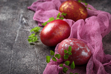 Easter painted red chicken eggs