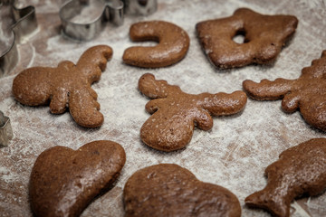 Christmas homemade gingerbread cookies on wooden table