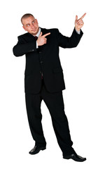 Fototapeta premium Businessman pointing at copy space against white background
