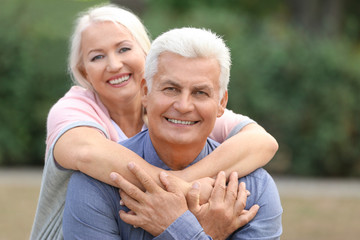 Mature couple together in park