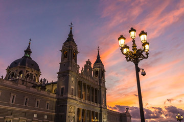 Fototapeta na wymiar Almudena Cathedral at sunset, a Catholic church in Madrid, Spain. It is the seat of the Roman Catholic Archdiocese of Madrid. 