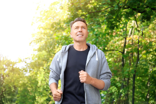 Mature Sporty Man Running Outdoors