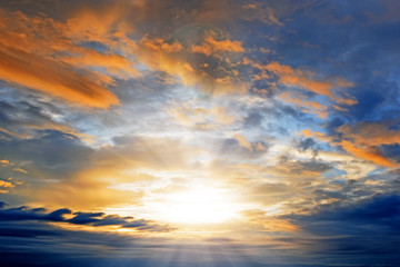 Fototapeta na wymiar Clouds and Sunset with sun rays