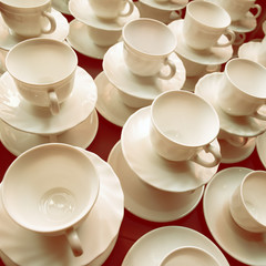 White teacups and saucers 
