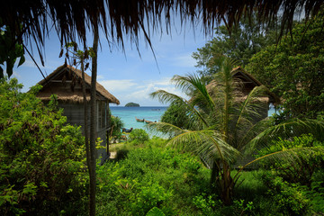 Fototapeta na wymiar Ocean view from a jungle hill with a small island taken in paradise – Andaman Sea, South Thailand