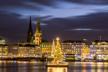Christmas in Hamburg. Panoramic view of the decorated city center from Alster Lake, view to Hamburg...