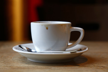 Close up white cup of black coffee on table