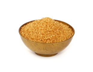 Vintage metal bowl full of brown cane sugar