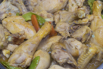 chopped chicken cooking in the kitchen pot