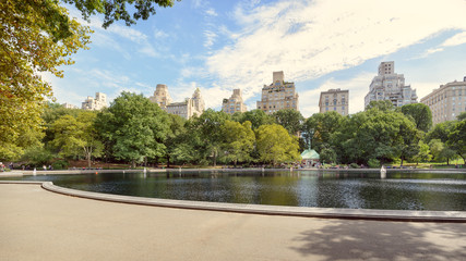 View of New York City from Central Park's boating area.