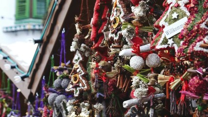 christmas market wreaths decoration snowflakes stall details snow kiosk 4k - Powered by Adobe