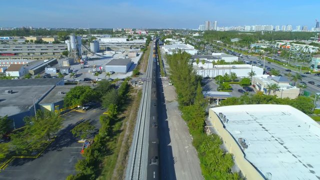 Aerial drone flying over a train in motion