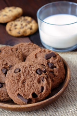 Chocolate cookies and glass of milk for breakfast.