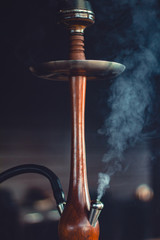 Stylish hookah made of glass and wood