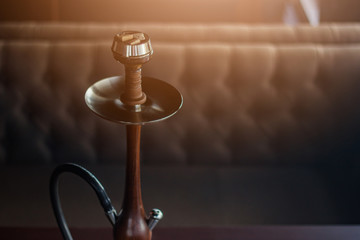 Stylish hookah made of glass and wood