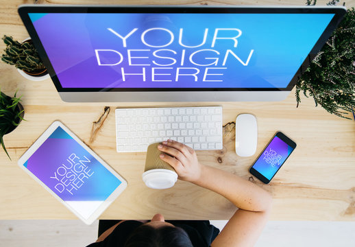 Desktop User Drinking Coffe with Tablet and Smartphone Mockup