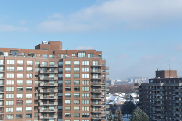 Modern condo buildings with huge windows and balconies in Montreal, Canada.