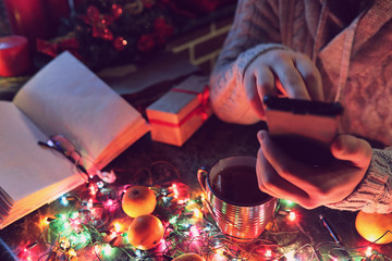man with a blank book in his hands for the New Year's table with
