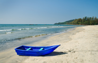 Fototapeta premium Blue Boat On A Beach