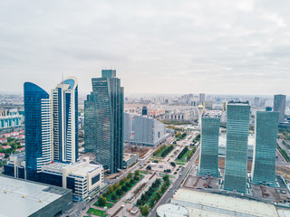 Naklejka na ściany i meble Drone view on buildings in downtown of capital city Astana in Kazakhstan